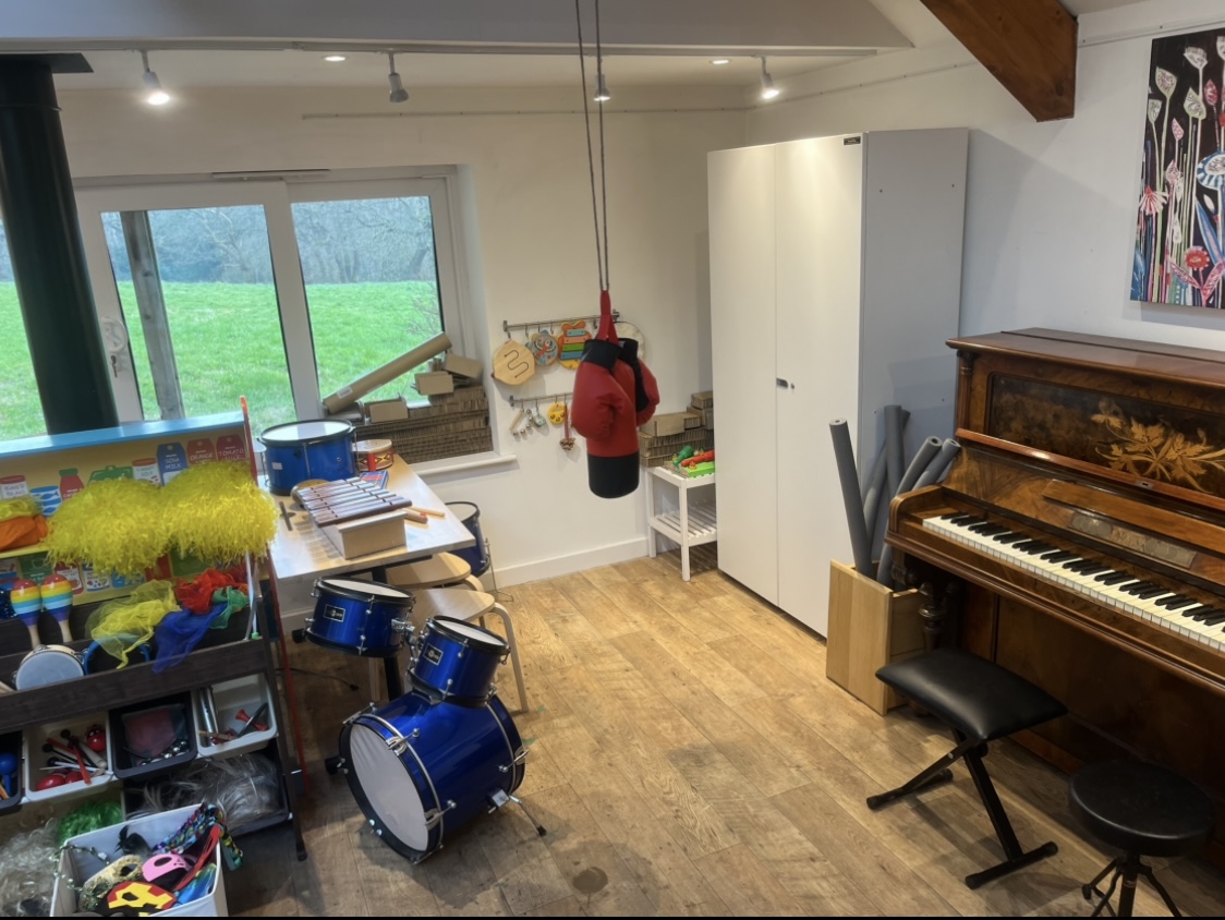 As you are Child Play Therapy space with piano As you are Child Play Therapy space with piano and large windows